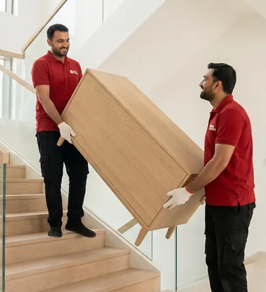 Ehouse Mover crew relocating a home in Al Manhal